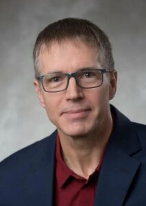 Portrait photo of Dr. John Dutcher, a keynote speaker at CUPC 2022.