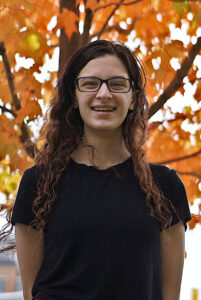 Portrait photo of Ashley Geddes, Co-Chair of the CUPC 2022 Organizing Team.