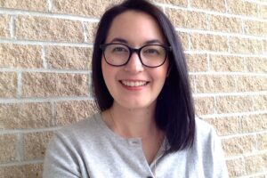 Portrait photo of Carley Miki, a member of the Physicists in the Workforce panel at CUPC 2022.